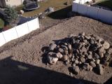 Back Yard Graded with pile of stones left for Lesley-Ann's Rockery that I have to build