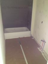 Floor covering for  main bath room in preparation for paint spraying