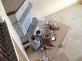 Building stone fireplace workman taking a call