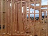Standing in music room looking through framing walls