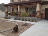 Front with the Dappled Willow and the two burning bush trees either side of the stairs