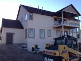 Rough grading on  back of garage door