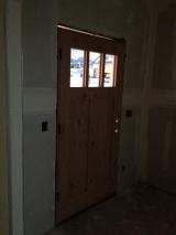 Front door viewed from the inside entrance - Obviously no lights inside the house yet and this was taken about 8pm so it looks little dark in the hall way