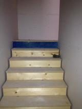 Stairs up from basement - these are four foot wide which makes it easy to get things up and down.