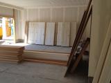 Doors and floor boards delivered in garage