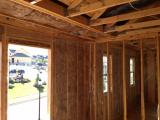 Starting insulation in 2nd bedroom and laundry room