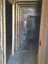 Basement corridoor to cold storage under entrance to house