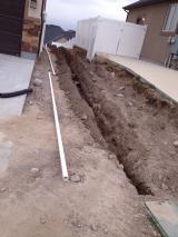 Main water pipe trench to be below concrete pad