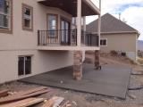 Concrete pad completed under deck