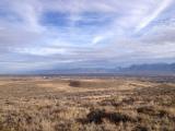 Oquirrh Mountain Temple to left behind open ground