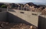 Basement Shell - View from front showing back of Garages where Office will be