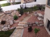 View from lower deck to pathway and steps to right of house