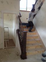 Workman working on the staircase
