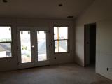 Master Bedroom sheet rock completed with metal strip around windows