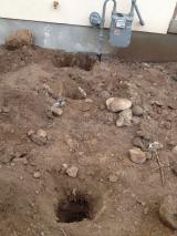 Fence holes on front left behind gas meter