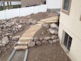 Flagstone path from garage looks great