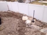 Lower rock wall and building pit