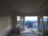 Looking of french doors from master bedroom