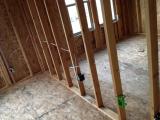 Standing in 4th Bedroom looking into 3rd Bedroom with electrics