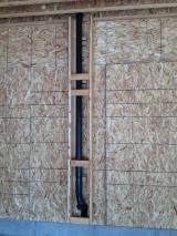 Watse sewer pipe from upstairs through garage back wall