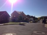 Photo from elbow in street on a bright sunny day