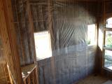 Insulation on back wall of great room called lounge