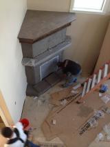 Fireplace workman building the stone work