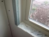Close up of metal strip around window frames