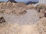Filling Under Garage with Gravel as Cannot Move Rock Front View