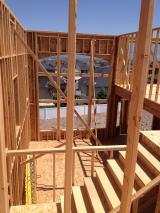 Standing in Laundry Room looking through wall to staircase and lounge