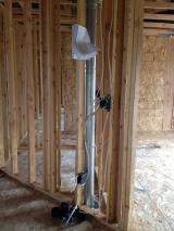 Standing on top of landing looking into 2nd bedroom with walk in closet on left