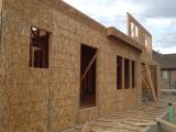 Front view of half bathroom, entrance door and music room