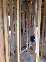 Standing in 2nd bedroom looking through hallway into master bedroom