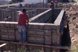 Pouring Cement into Foundation Template and Finishing 2