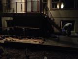 Workman working stairs late at night to get finished