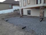 Drain pipes in place under pad