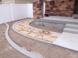 Flagstone at front left of house