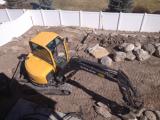 Lower rock wall and building pit