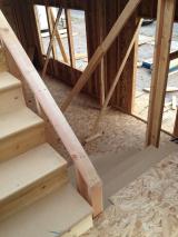 Staircase from upstairs going down to lounge