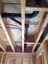 Master tub plumbing under floor