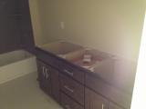Main bathroom cabnets in place