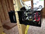 Notice how they fix the electric boxes, they do not use any screws only two nails one top and one bottom in the angled plastic, it's cheap and fast!