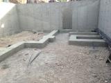Basement Shell - View from back showing doorway into Cold Storage in Basement under front Porch Way