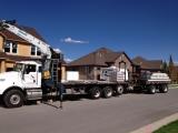 That's quite the long vehicle to carry and deliver the sheetrock