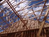 Trusses above lounge and landry on left