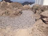 Filling with Gravel Under Garage as Cannot Move Rock