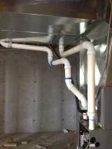Water heater pipes from furnace