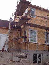 Scafolding assembly at back of house