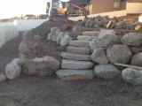 Lower rock wall and building pit