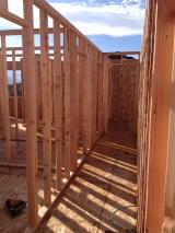 Upstairs hallway to bathroom on left and two bedrooms on right